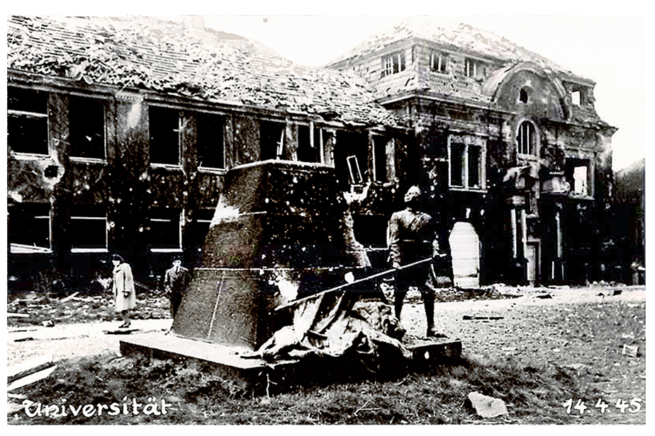 Postkarte des zerstörten Hauptgebäudes und Wissmann-Denkmals