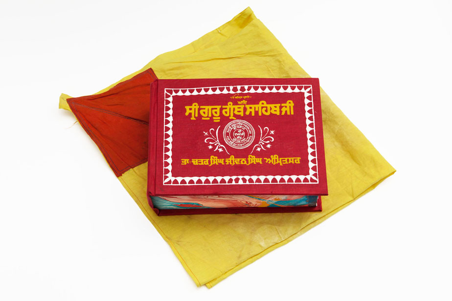 The picture shows the books cover, its red with yellow script