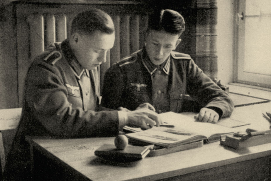 Medical students in uniform in a dormitory around 1940