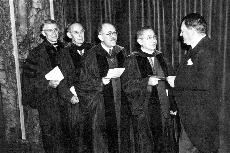 The Swedish ambassador presents Stern and Rabi with the Nobel Prize for Physics